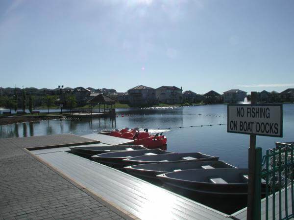 Fishing and boating on Arbour Lake, Calgary, Alberta.